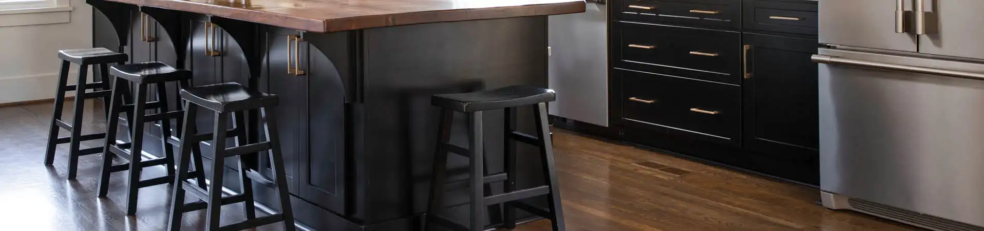 Photo of kitchen with custom black paint color