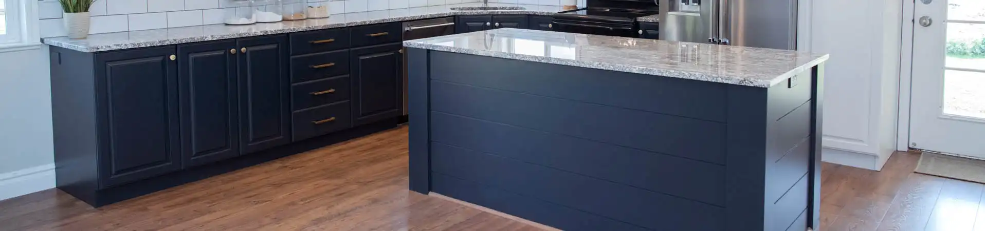 Photo of kitchen with custom navy blue paint color