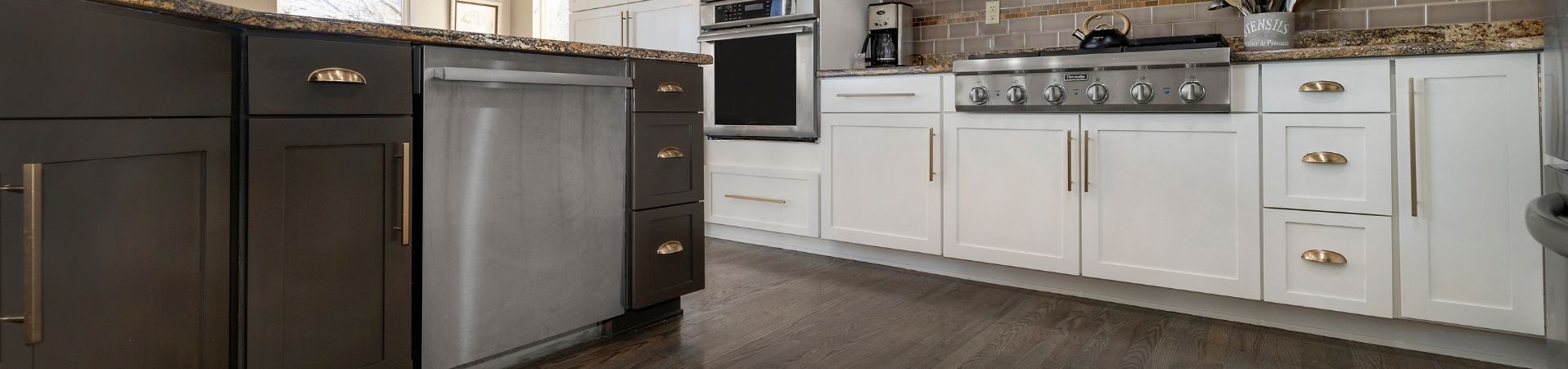 Photo of kitchen with new replace��d wooden cabinets